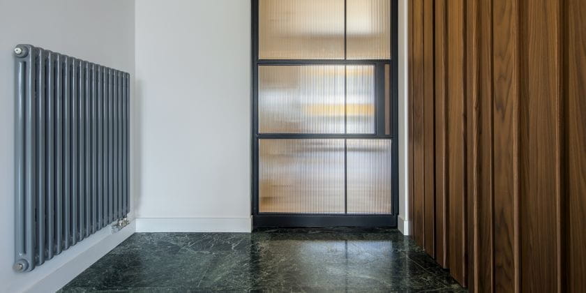 VVS design Barault Architects korridor Delta seksjonsradiator