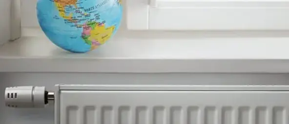 Globe with a radiator installed below it