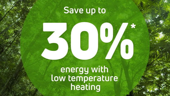 Graphic showing ‘Save up to 30% energy with low temperature heating’ over a forest background.